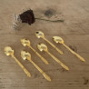 Cuillère à café en métal doré